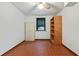 Bedroom featuring unique flooring, built in shelves, and natural light at 2420 Leaf Land Dr, Duluth, GA 30097