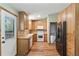 Kitchen with wooden cabinets, butcher block counters, and stainless steel appliances at 2420 Leaf Land Dr, Duluth, GA 30097