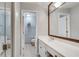 Hall bathroom featuring a vanity and a view into a separate toilet and shower room at 3203 Lenox Ne Rd # 22, Atlanta, GA 30324