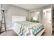 Bedroom with light gray walls, neutral carpet, and modern decor at 3203 Lenox Ne Rd # 22, Atlanta, GA 30324