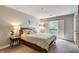 Relaxing bedroom with a large window and neutral decor at 3203 Lenox Ne Rd # 22, Atlanta, GA 30324