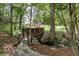 Wooden bridge over a creek in a lush, green community, adding charm to the natural setting at 3203 Lenox Ne Rd # 22, Atlanta, GA 30324