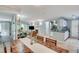 Open-concept layout with dining table, hardwood floors, and seamless flow to living spaces at 3203 Lenox Ne Rd # 22, Atlanta, GA 30324