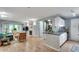 Bright living room with fireplace, hardwood floors, and smooth transition to the kitchen at 3203 Lenox Ne Rd # 22, Atlanta, GA 30324