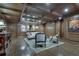 Elegant seating area featuring dark wood paneling, coffered ceilings, hardwood floors, and sophisticated decor at 3203 Lenox Ne Rd # 22, Atlanta, GA 30324