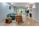 Cozy living room with fireplace, hardwood floors, and open access to the outdoor patio at 3203 Lenox Ne Rd # 22, Atlanta, GA 30324