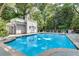 Sparkling community pool with lush landscaping and ample seating creates a relaxing atmosphere at 3203 Lenox Ne Rd # 22, Atlanta, GA 30324