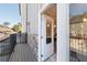 Balcony view of kitchen with stainless steel appliances and quartz counters and dining area at 3794 Jack Vernon Cir, Powder Springs, GA 30127