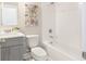 Bathroom showcasing a modern vanity, toilet, and shower-tub combo at 3794 Jack Vernon Cir, Powder Springs, GA 30127