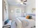 Cozy bedroom featuring neutral decor and furnishings, including a large art piece above the bed at 3794 Jack Vernon Cir, Powder Springs, GA 30127