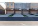 Modern townhome exterior featuring private garage and upper level balcony at 3794 Jack Vernon Cir, Powder Springs, GA 30127