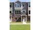 Close-up of a new townhome featuring stone accents and neutral color palettes at 3794 Jack Vernon Cir, Powder Springs, GA 30127