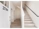 Bright foyer featuring new flooring, fresh white paint and stairs at 3794 Jack Vernon Cir, Powder Springs, GA 30127