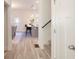 Modern kitchen with a center island, pendant lighting, and open layout with hardwood floors throughout at 3794 Jack Vernon Cir, Powder Springs, GA 30127