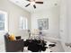 Stylish home office featuring a glass-top desk, modern decor, and comfortable seating, perfect for remote work at 3794 Jack Vernon Cir, Powder Springs, GA 30127