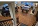 Finished basement featuring a bar, game area, and tile flooring at 6740 Mountain Lake Ln, Cumming, GA 30028