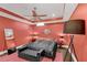 Airy bedroom with decorative floor lamp, large mirror, and black leather bench at 6740 Mountain Lake Ln, Cumming, GA 30028