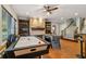 Spacious game room featuring an air hockey table, foosball, and built-in shelving at 6740 Mountain Lake Ln, Cumming, GA 30028