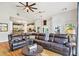 Expansive living room with vaulted ceilings, modern lighting, and abundant natural light at 6740 Mountain Lake Ln, Cumming, GA 30028