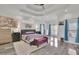 Bright and airy Primary suite with tray ceilings and stylish furnishings at 6740 Mountain Lake Ln, Cumming, GA 30028