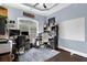 This home office includes a large window and lots of shelving at 6740 Mountain Lake Ln, Cumming, GA 30028