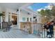 Lovely outdoor porch with a telescope to enjoy nature views at 6740 Mountain Lake Ln, Cumming, GA 30028