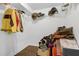 Walk-in closet with wire shelving and wood floors at 6740 Mountain Lake Ln, Cumming, GA 30028