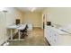 A sunlit bedroom is staged with a work-from-home desk and minimalist decor at 845 Spring Nw St # 127, Atlanta, GA 30308