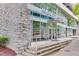 Modern building, Midcity Lofts, has large windows and a stone facade, located at 845 at 845 Spring Nw St # 127, Atlanta, GA 30308
