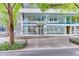 Modern building, Midcity Lofts, has large windows and a stone facade, located at 845 at 845 Spring Nw St # 127, Atlanta, GA 30308