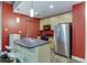 Modern kitchen with stainless steel appliances and eat in island at 845 Spring Nw St # 127, Atlanta, GA 30308