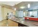 Spacious living area with modern countertops, stainless steel appliances, and an adjacent seating area at 845 Spring Nw St # 127, Atlanta, GA 30308