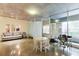 Open-concept living area boasts concrete floors, flexible seating, dining, and balcony access at 845 Spring Nw St # 127, Atlanta, GA 30308