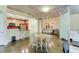 Open concept living space showcasing concrete floors, modern kitchen, dining, and flexible spaces at 845 Spring Nw St # 127, Atlanta, GA 30308