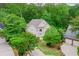 Aerial view of home showing a meticulously landscaped front yard and a side-entry garage at 10490 Cranchester Way, Alpharetta, GA 30022