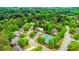 Lush community with tennis court, pool and plenty of trees provides a serene living experience at 10490 Cranchester Way, Alpharetta, GA 30022
