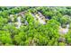 Aerial view of the property with boundary lines and the home inset at 10490 Cranchester Way, Alpharetta, GA 30022
