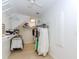 Walk-in closet offers ample storage space with built-in shelving at 10490 Cranchester Way, Alpharetta, GA 30022
