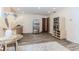 Well-lit kitchenette with stainless steel appliances and modern cabinetry at 10490 Cranchester Way, Alpharetta, GA 30022