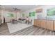 Inviting living room with a dining area and a partial kitchen at 10490 Cranchester Way, Alpharetta, GA 30022