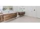 Luxurious main bathroom with dual vanities and modern fixtures at 10490 Cranchester Way, Alpharetta, GA 30022