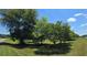 Lush trees line this property, offering shade and privacy at 14721 Highway 36, Covington, GA 30014