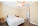 Bedroom with a ceiling fan and a view of the ensuite bathroom at 2114 Woodland Ln, Alpharetta, GA 30009
