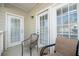 Inviting outdoor patio with comfortable seating, perfect for relaxing and enjoying fresh air at 2114 Woodland Ln, Alpharetta, GA 30009