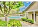 Community swimming pool offers a great location with lush landscaping and clubhouse access at 2114 Woodland Ln, Alpharetta, GA 30009
