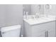 This bathroom features white cabinets, and a marble countertop at 255 Northland Ridge Trl, Atlanta, GA 30342