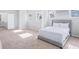 Light-filled bedroom with plush carpeting, neutral walls, and a comfortable bed at 255 Northland Ridge Trl, Atlanta, GA 30342