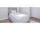 Modern bedroom features a bed, wood flooring, and a bright, airy atmosphere at 255 Northland Ridge Trl, Atlanta, GA 30342