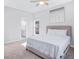 Comfortable bedroom with plush carpet and a view into the bathroom at 255 Northland Ridge Trl, Atlanta, GA 30342