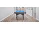 The game room features a hardwood floor and a pool table at 255 Northland Ridge Trl, Atlanta, GA 30342